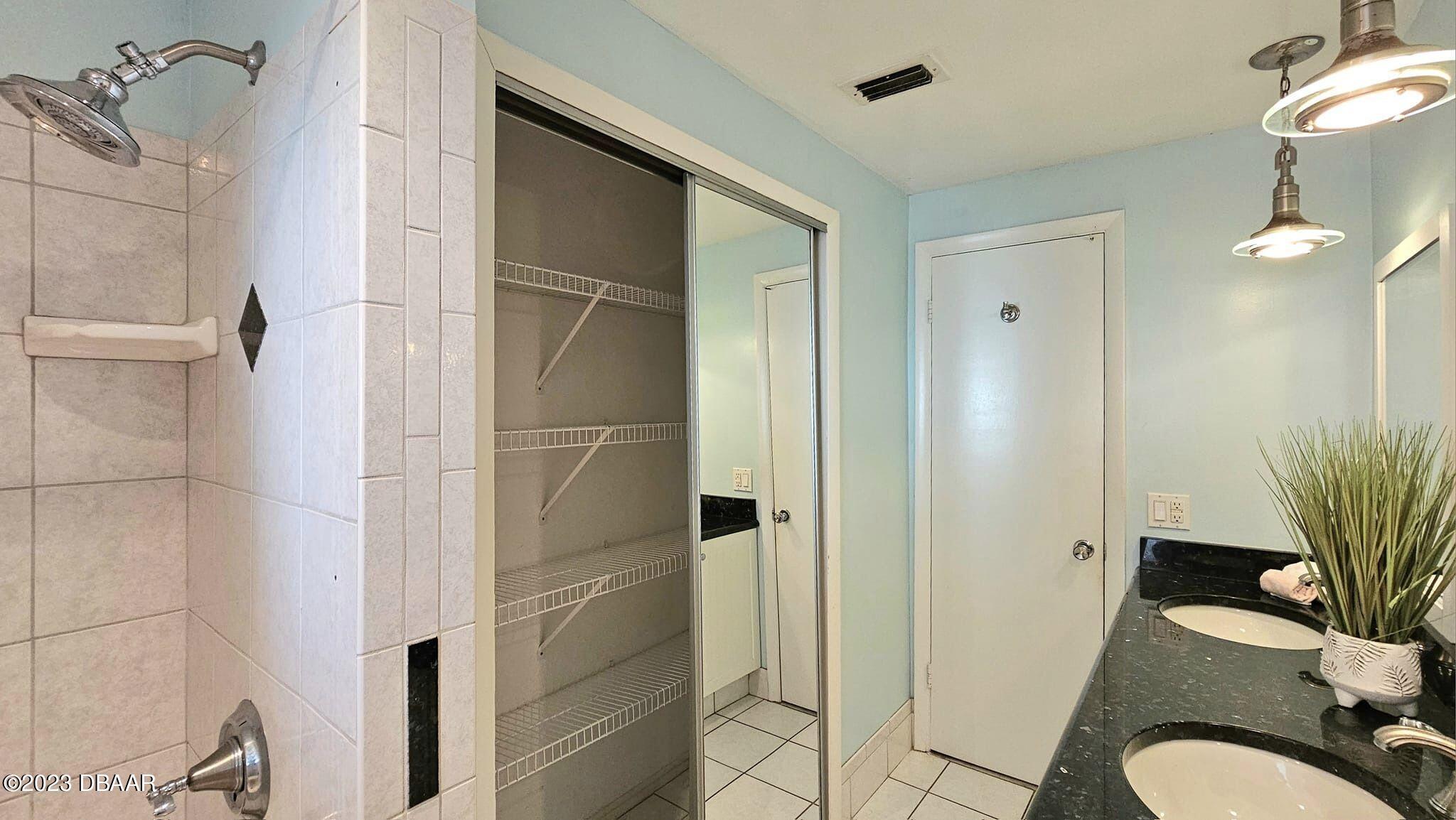 6 Sunrise Avenue Ormond Beach, FL 32176 - Photo 59 of 83 a bathroom with a shower and a toilet