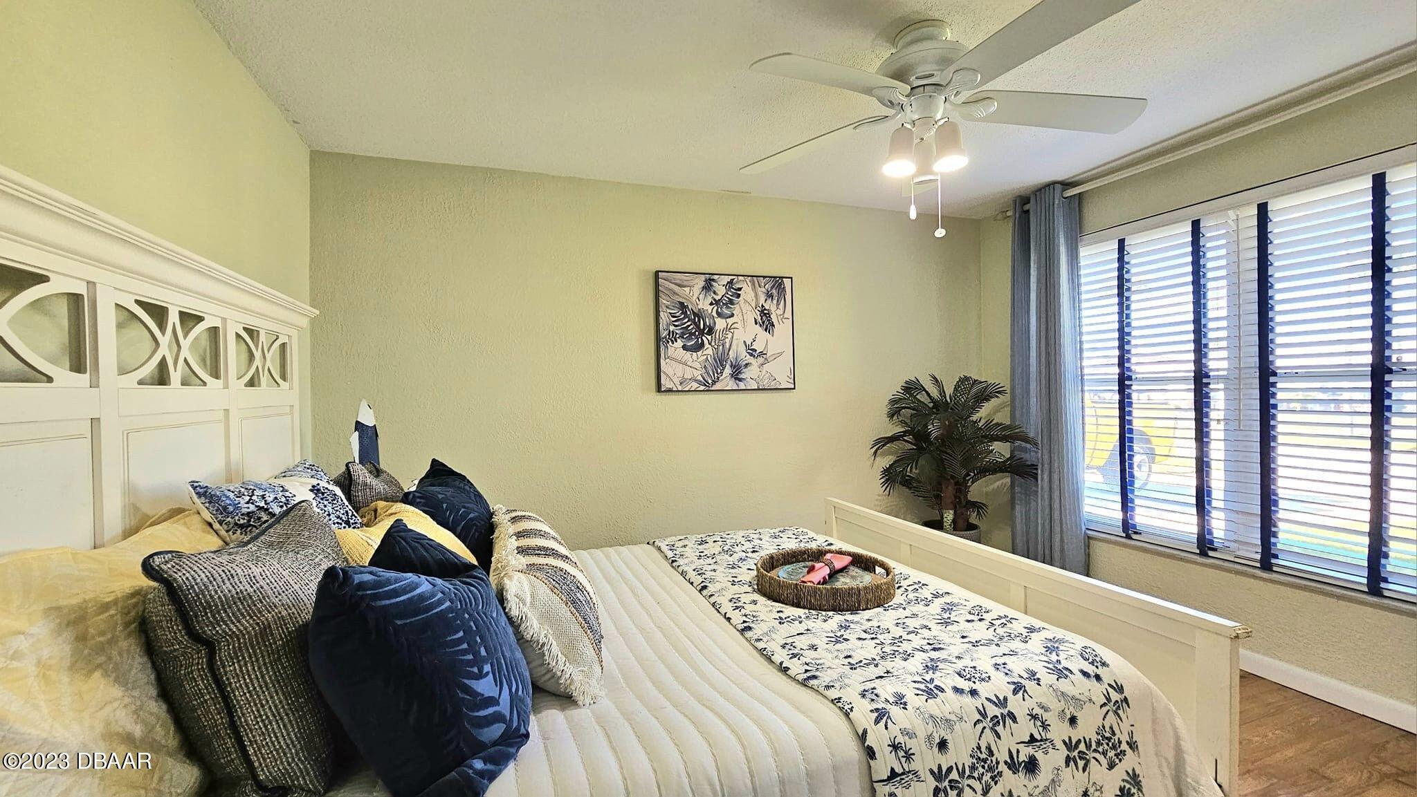 6 Sunrise Avenue Ormond Beach, FL 32176 - Photo 63 of 83 a bedroom with a bed and a window