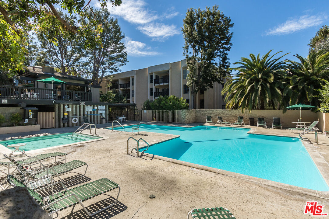 3205 Raintree Circle Culver City, CA 90230 - Photo 13 of 14 a view of a backyard with a patio and swimming pool