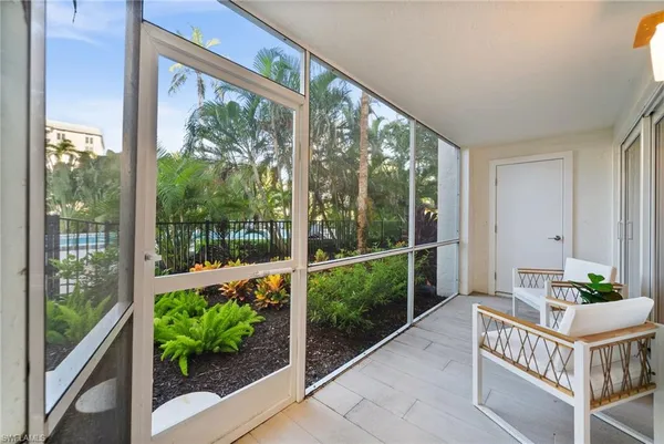 a view of a porch with furniture