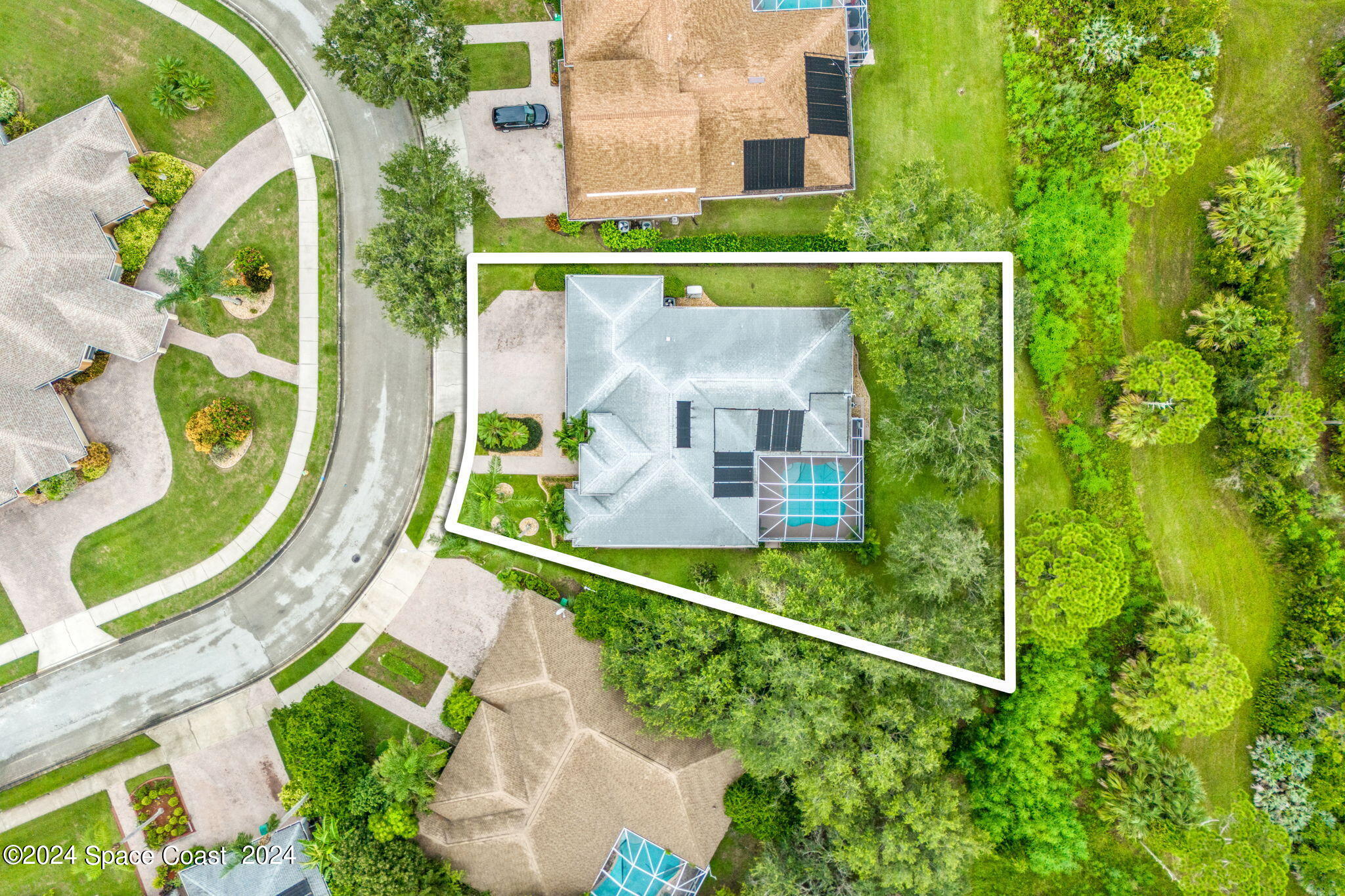 1633 Quinn Drive Rockledge, FL 32955 - Photo 2 of 50 aerial view of a house with a garden