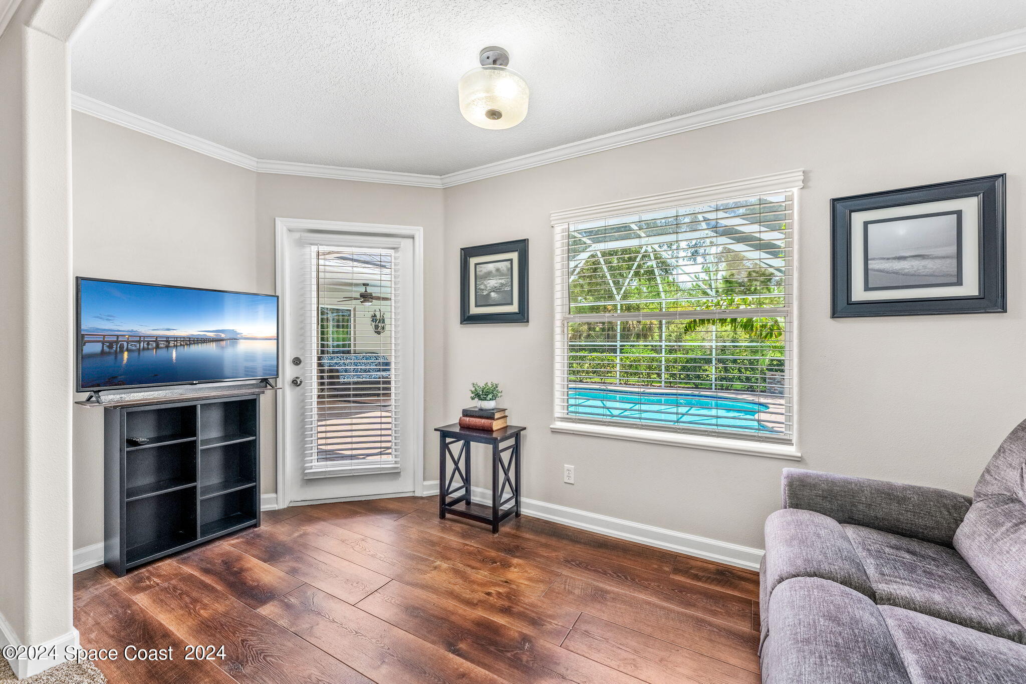 1633 Quinn Drive Rockledge, FL 32955 - Photo 21 of 50 a living room with furniture and a window