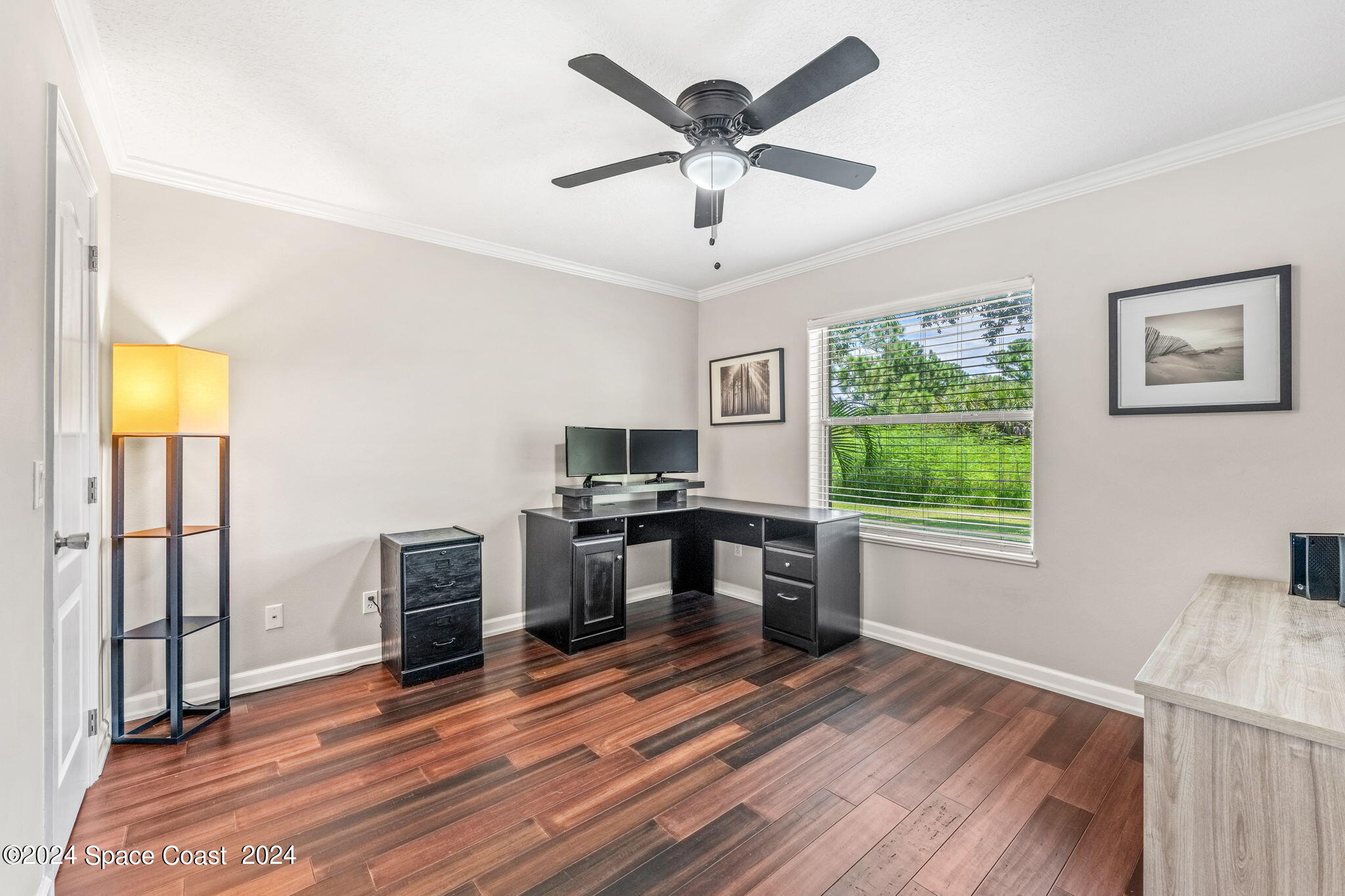 1633 Quinn Drive Rockledge, FL 32955 - Photo 24 of 50 a kitchen with stainless steel appliances granite countertop a stove and a refrigerator