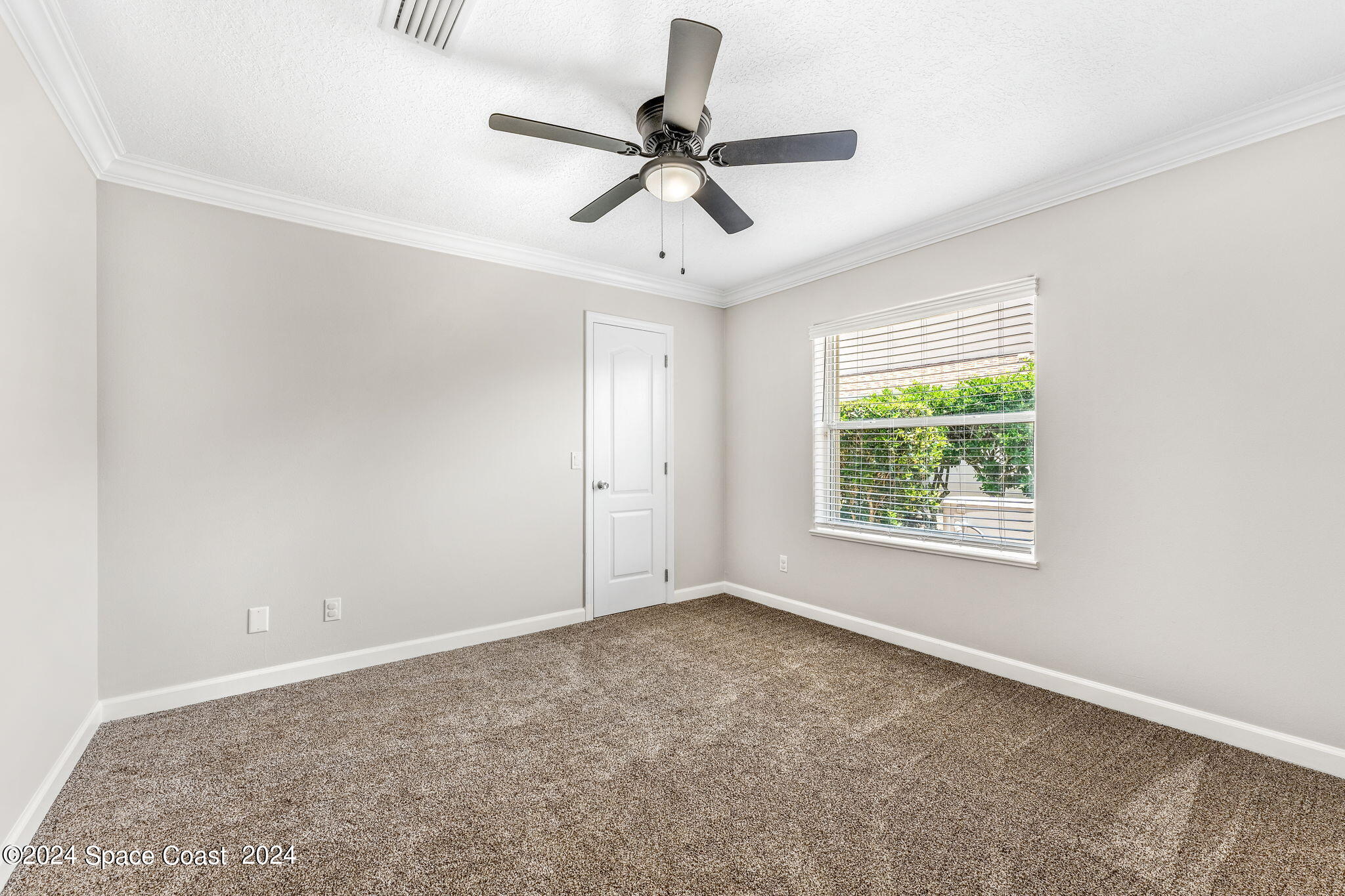 1633 Quinn Drive Rockledge, FL 32955 - Photo 27 of 50 a view of an empty room with a window