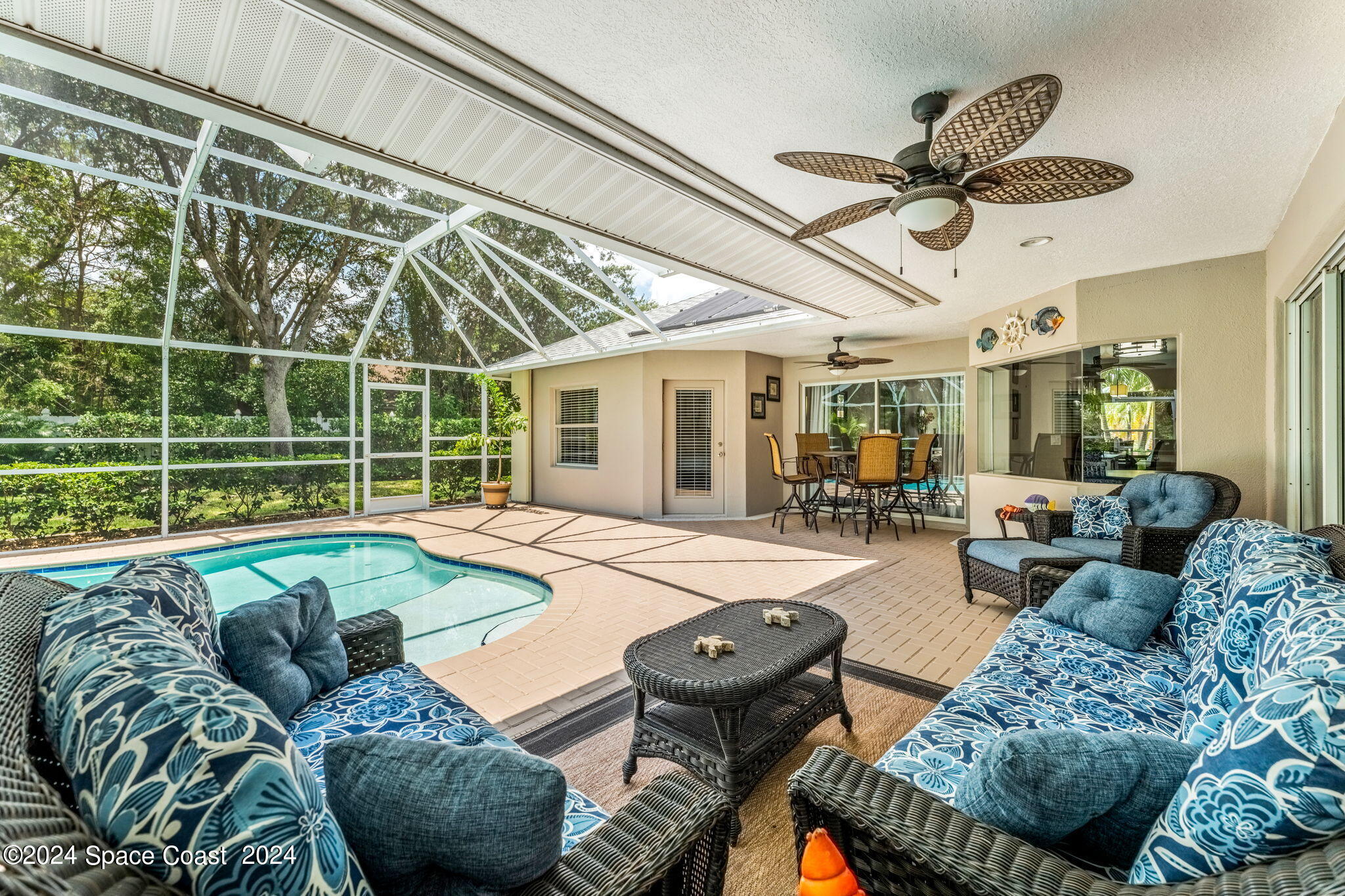 1633 Quinn Drive Rockledge, FL 32955 - Photo 33 of 50 a living room with furniture and a large window