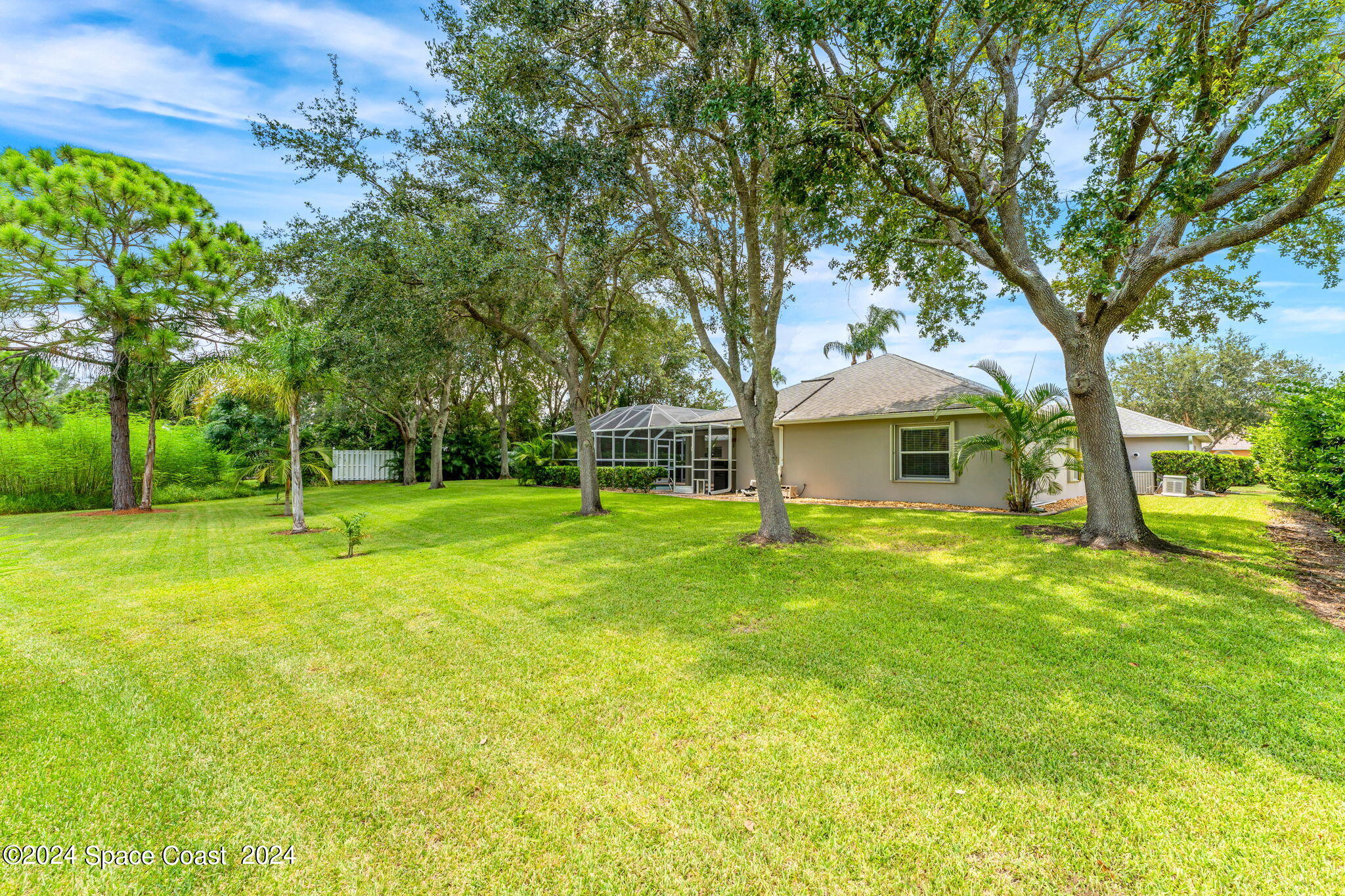 1633 Quinn Drive Rockledge, FL 32955 - Photo 37 of 50 a view of a house with a backyard
