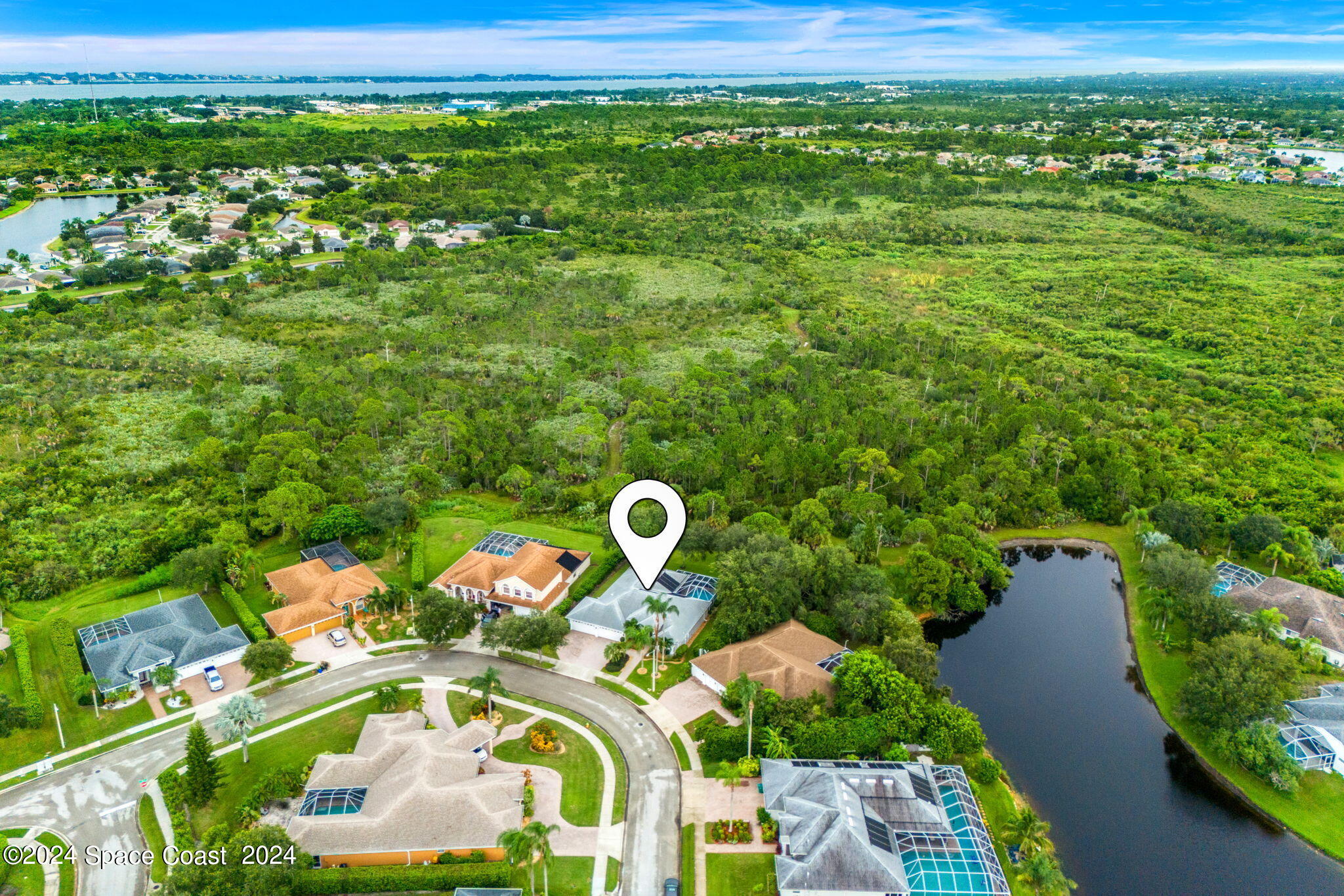 1633 Quinn Drive Rockledge, FL 32955 - Photo 41 of 50 a aerial view of a house with a yard basket ball court and outdoor seating