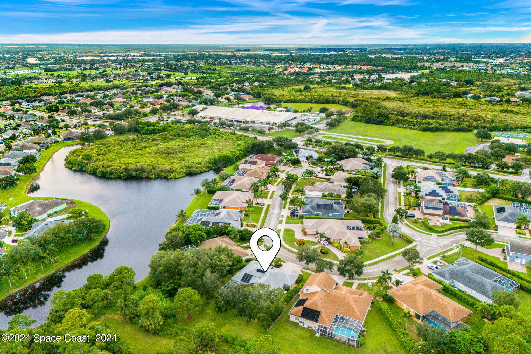 1633 Quinn Drive Rockledge, FL 32955 - Photo 42 of 50 an aerial view of residential houses with outdoor space and swimming pool