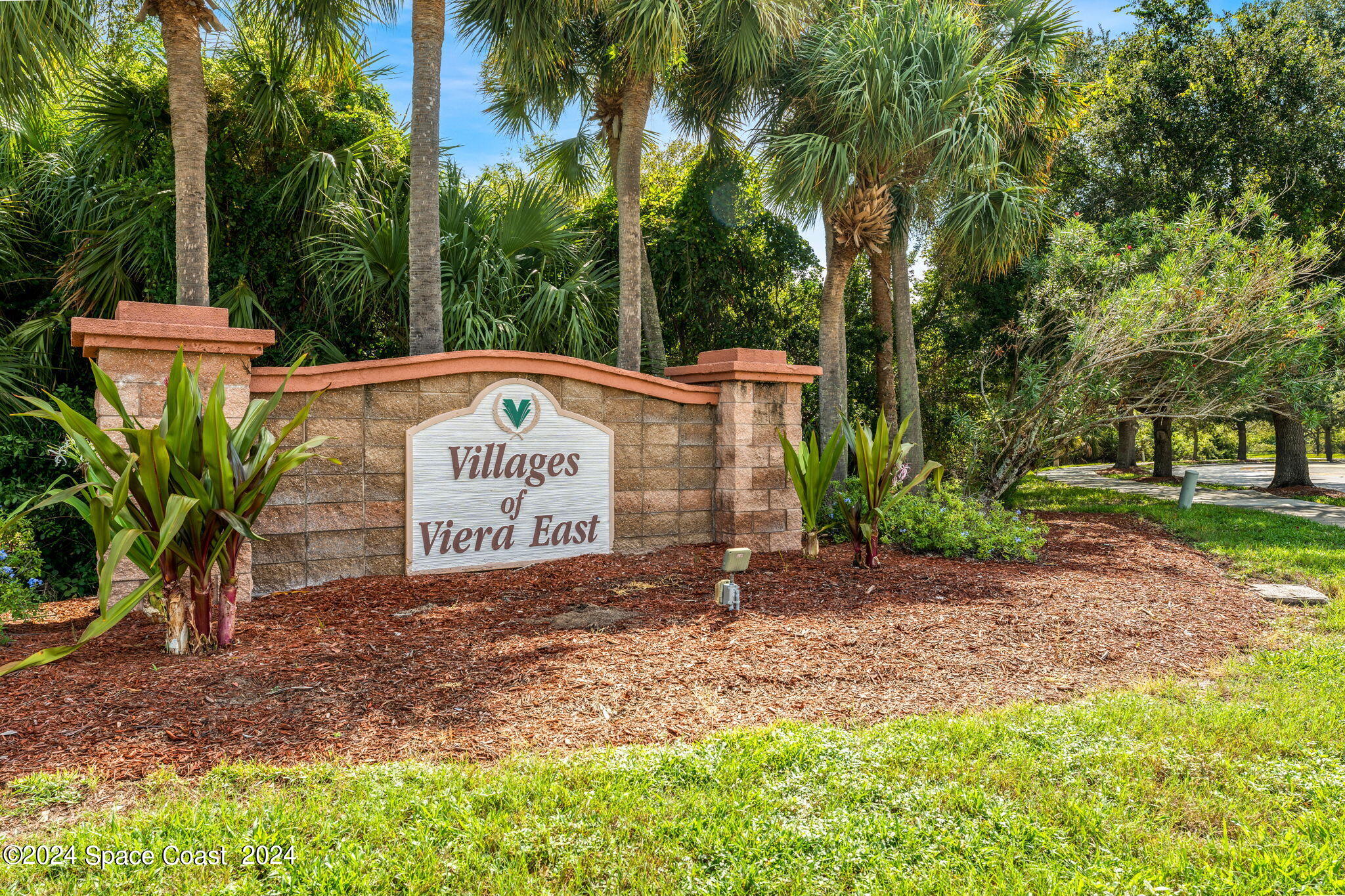 1633 Quinn Drive Rockledge, FL 32955 - Photo 47 of 50 a sign that is sitting in front of a tree