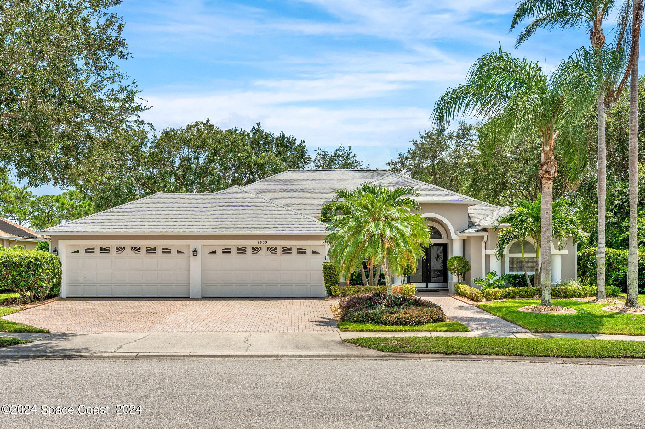 1633 Quinn Drive Rockledge, FL 32955 - Photo 49 of 50 a front view of a house with a yard