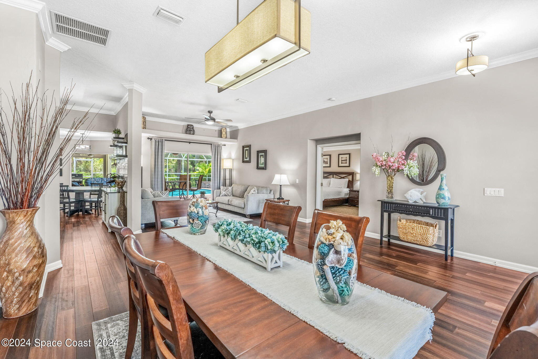 1633 Quinn Drive Rockledge, FL 32955 - Photo 7 of 50 a living room with fireplace furniture and a wooden floor