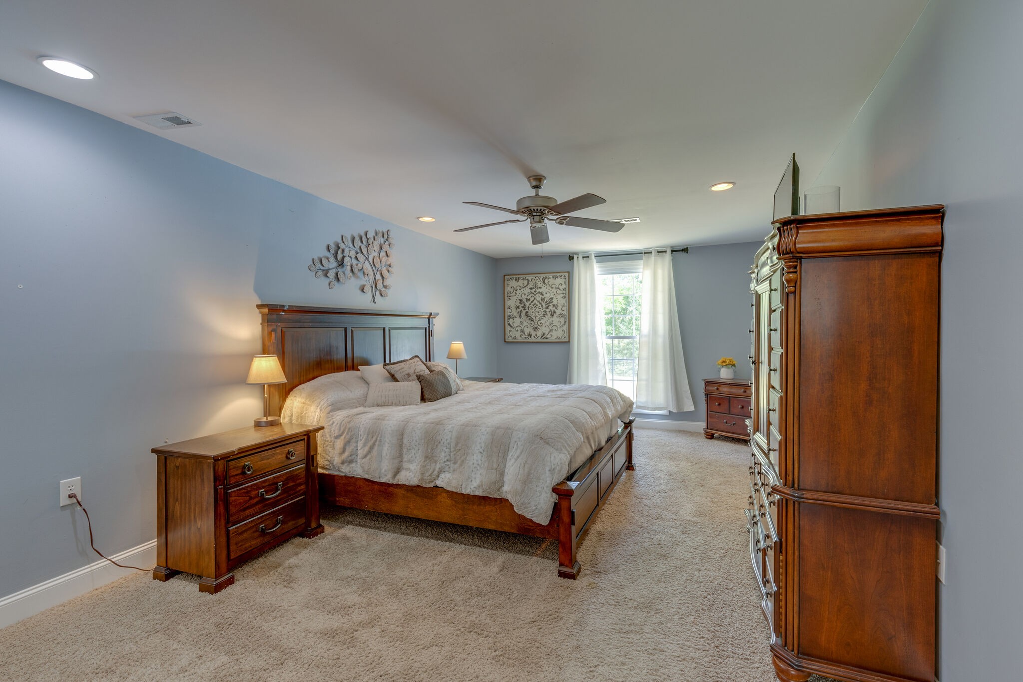 3003 Greens Mill Road Spring Hill, TN 37174 - Photo 13 of 48 a bed sitting in a spacious bedroom next to a window