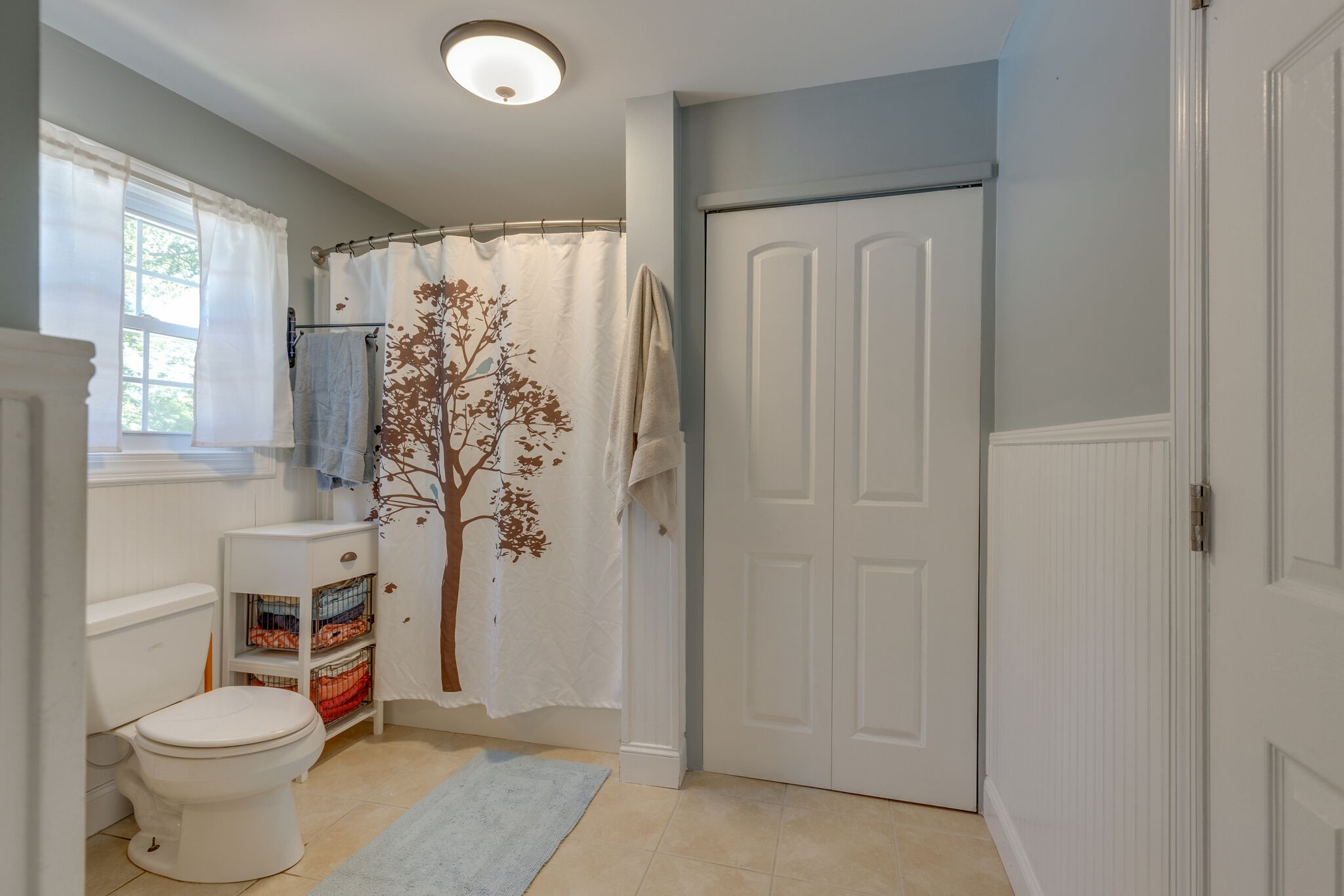 3003 Greens Mill Road Spring Hill, TN 37174 - Photo 15 of 48 a bathroom with a toilet sink and shower
