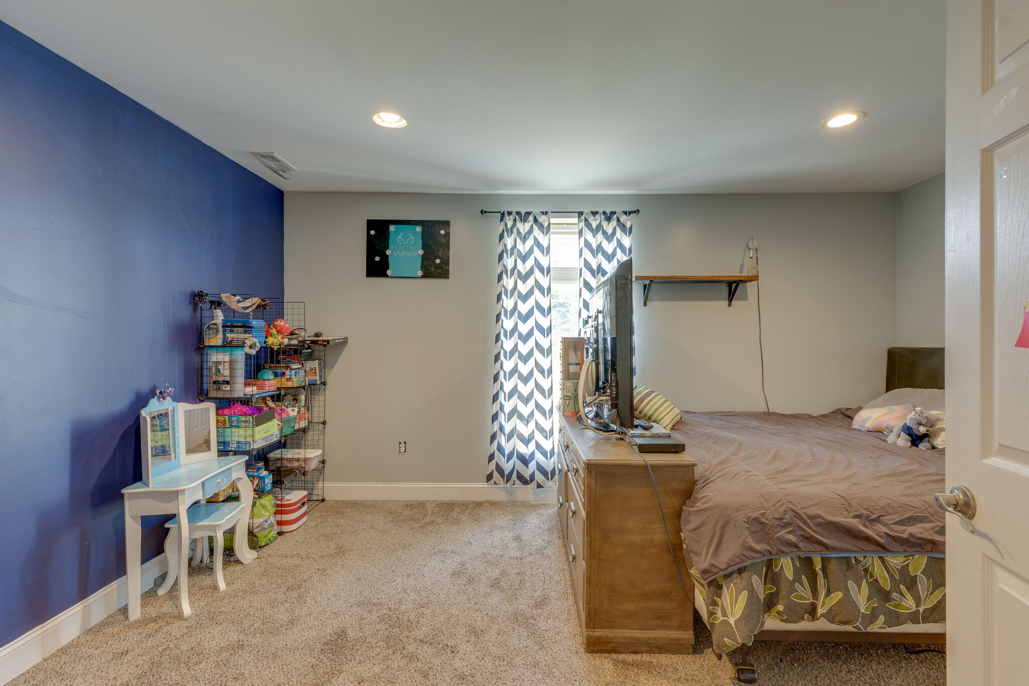 3003 Greens Mill Road Spring Hill, TN 37174 - Photo 17 of 48 a bedroom with a bed and a window