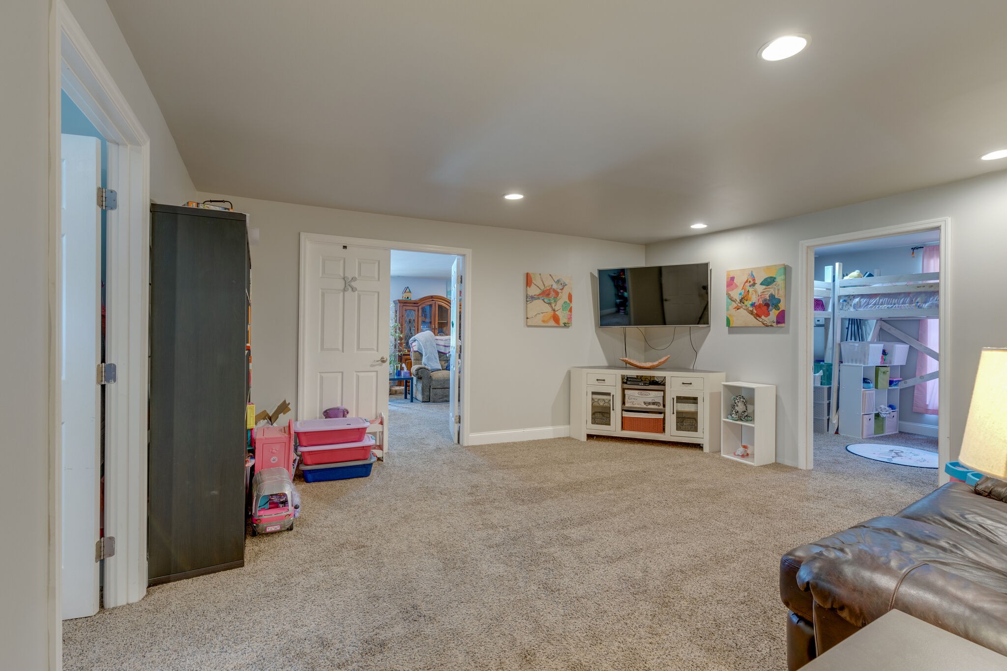 3003 Greens Mill Road Spring Hill, TN 37174 - Photo 19 of 48 a living room with furniture and a flat screen tv