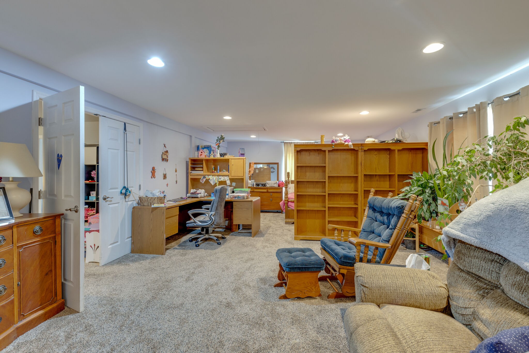 3003 Greens Mill Road Spring Hill, TN 37174 - Photo 23 of 48 a view of a livingroom with workspace and a couch