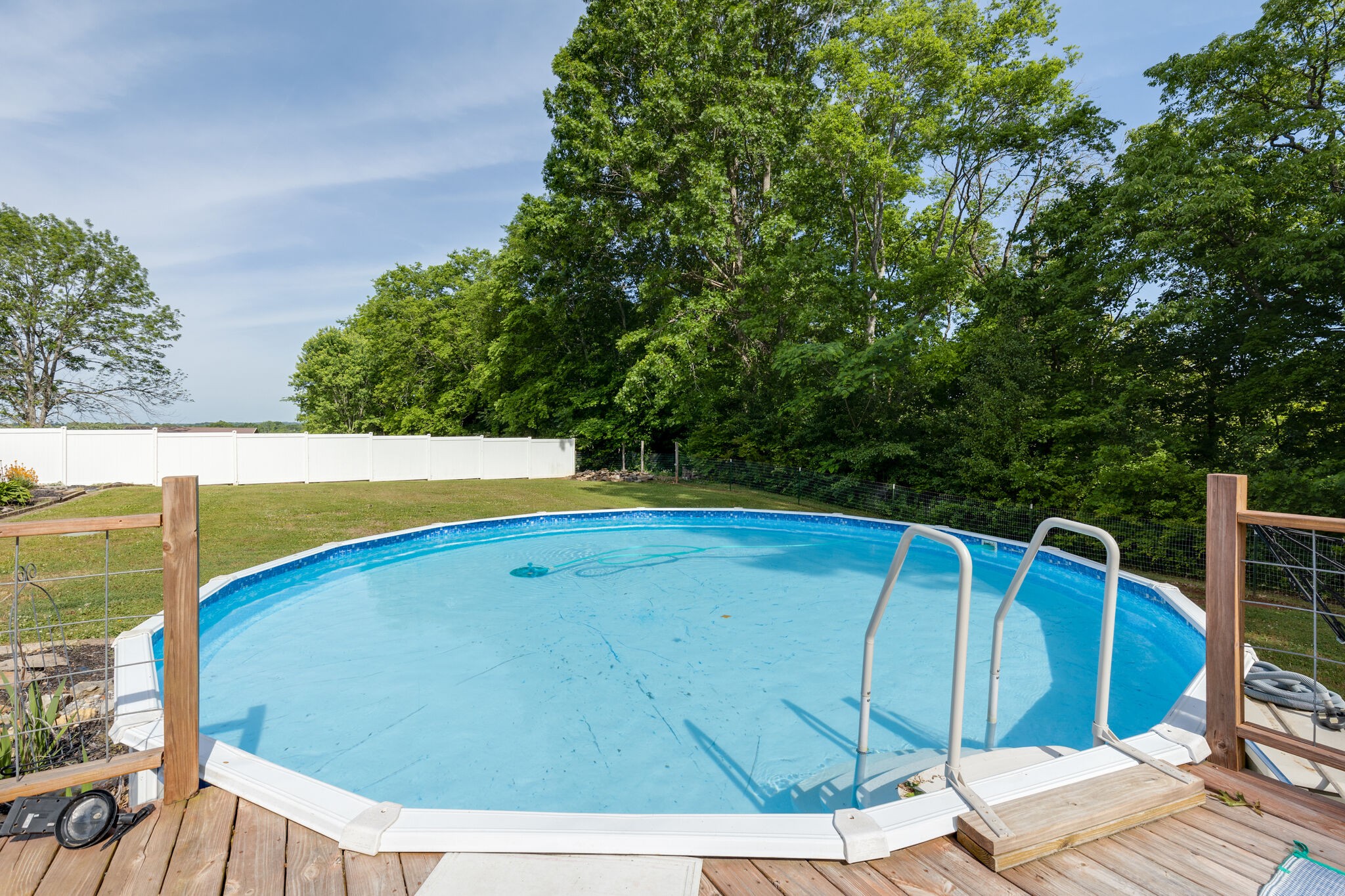 3003 Greens Mill Road Spring Hill, TN 37174 - Photo 32 of 48 a view of a swimming pool with an outdoor seating