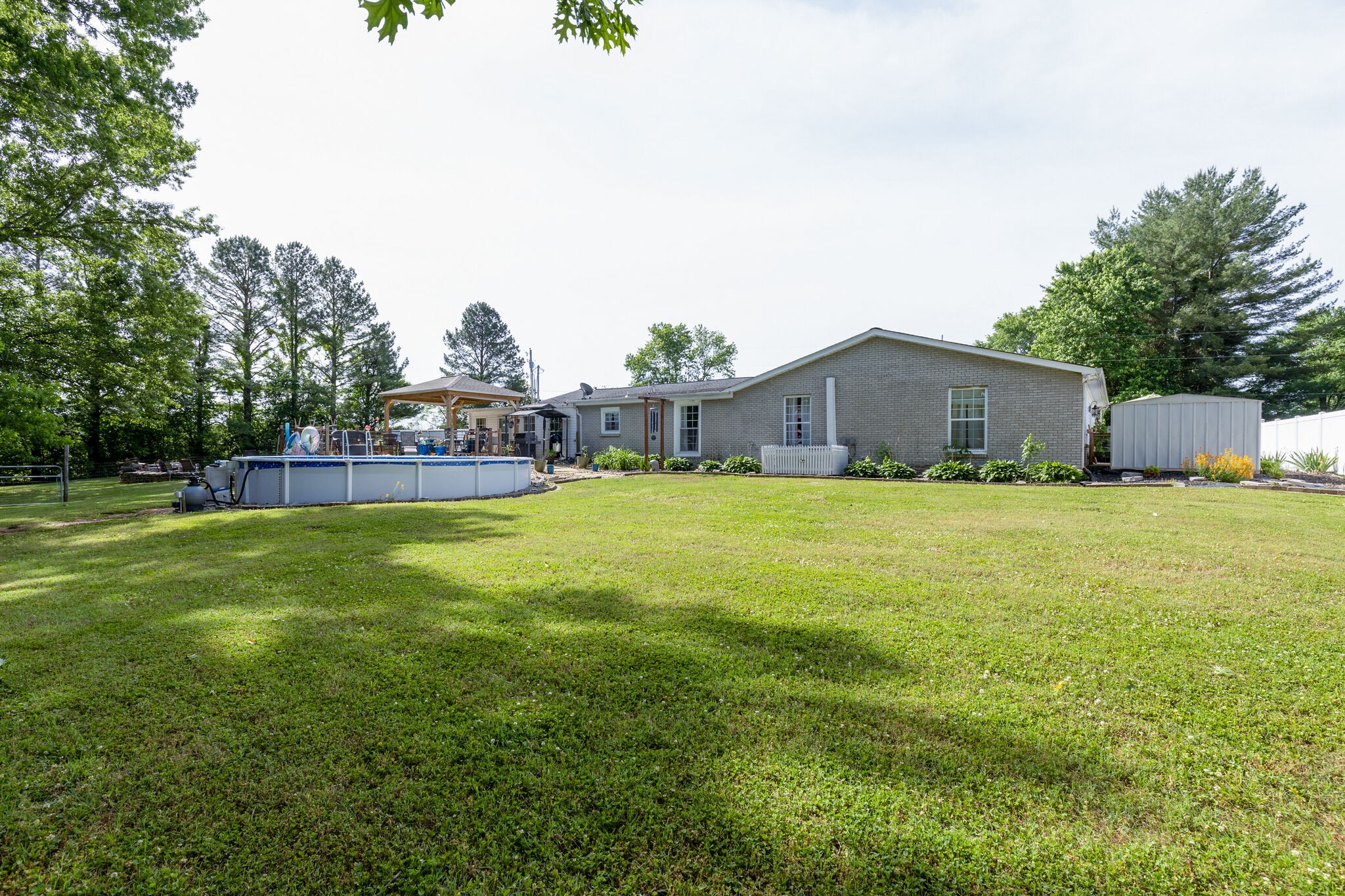3003 Greens Mill Road Spring Hill, TN 37174 - Photo 34 of 48 a view of a house with a big yard