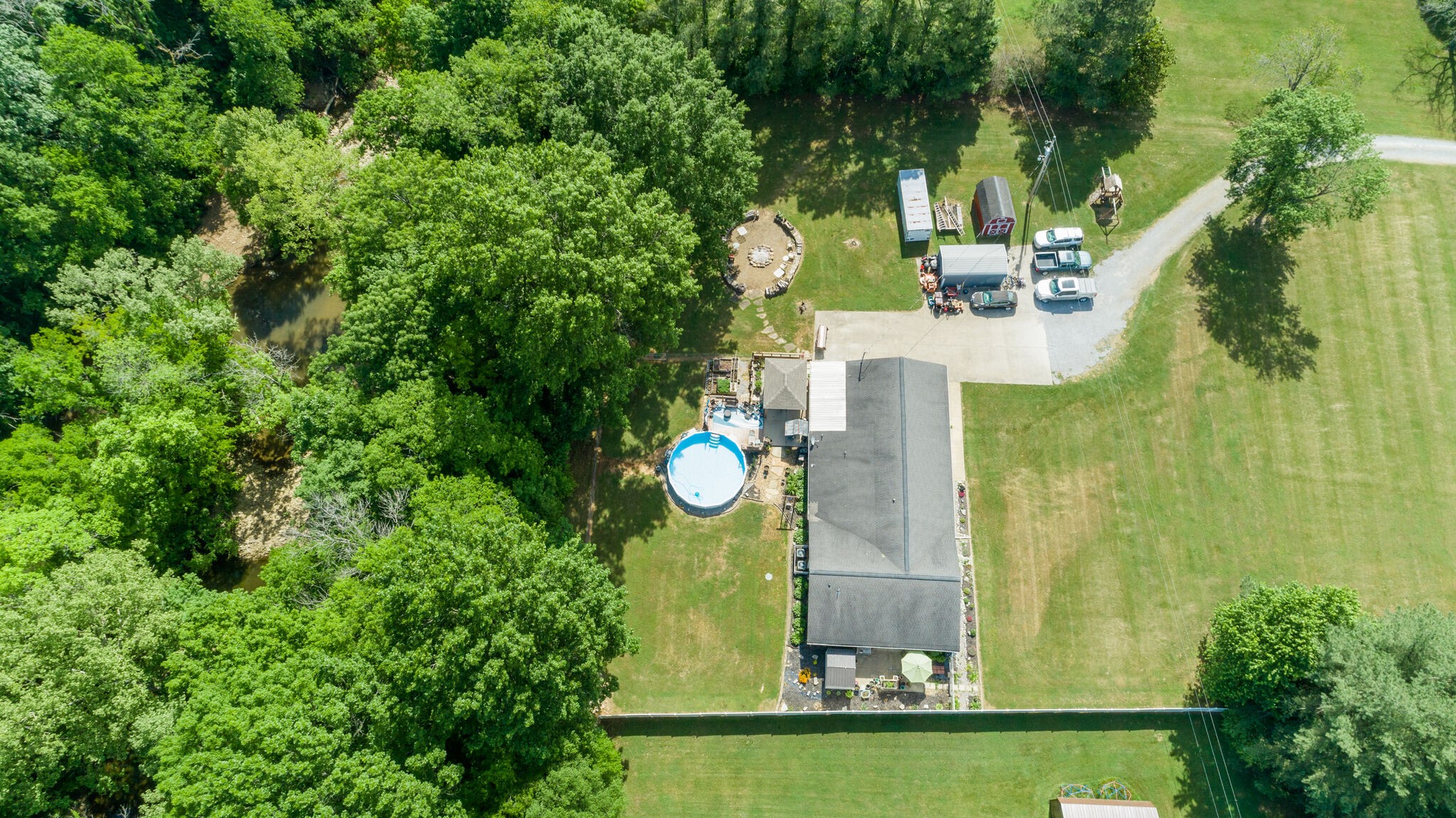 3003 Greens Mill Road Spring Hill, TN 37174 - Photo 43 of 48 an aerial view of house with yard swimming pool and outdoor seating