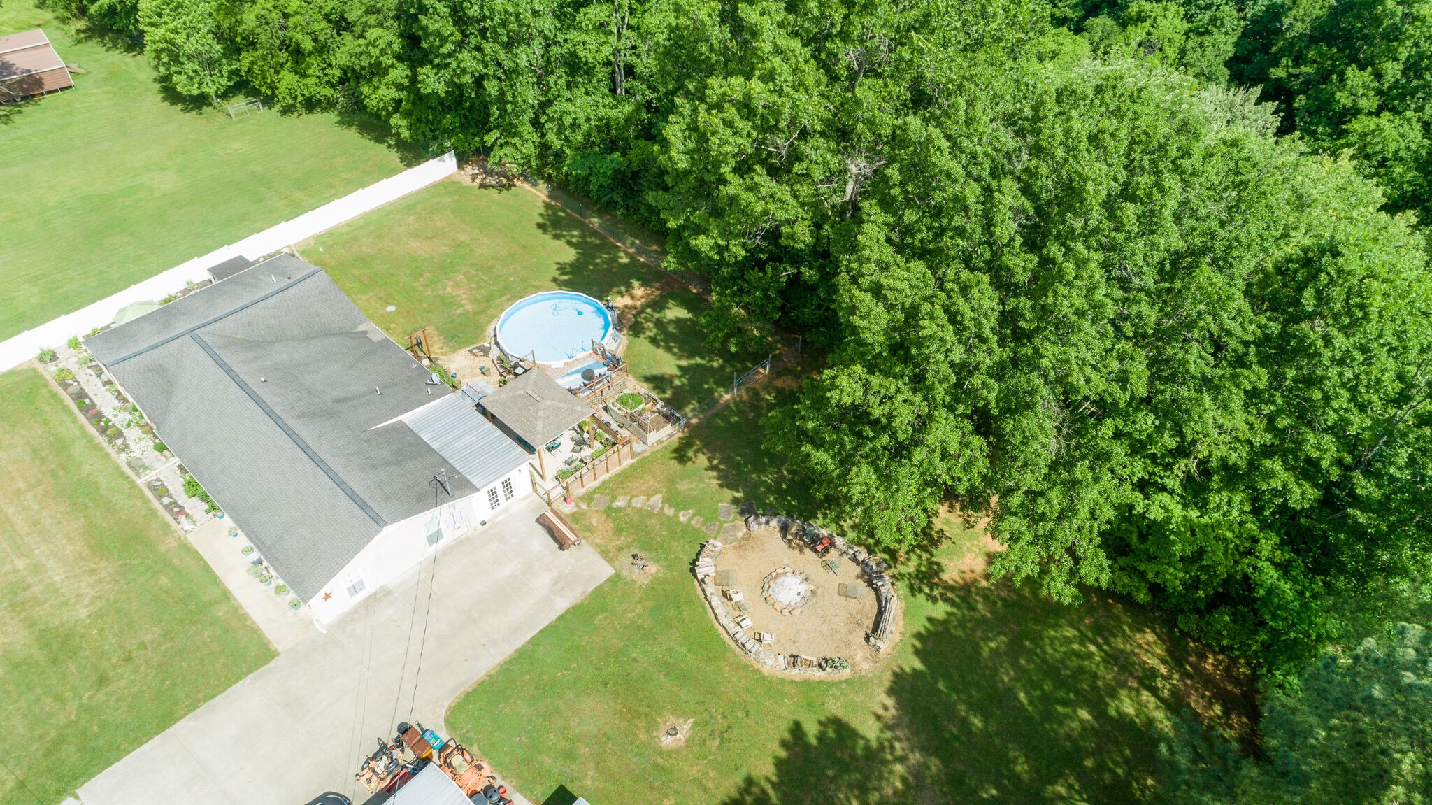 3003 Greens Mill Road Spring Hill, TN 37174 - Photo 46 of 48 a view of a swimming pool in a backyard