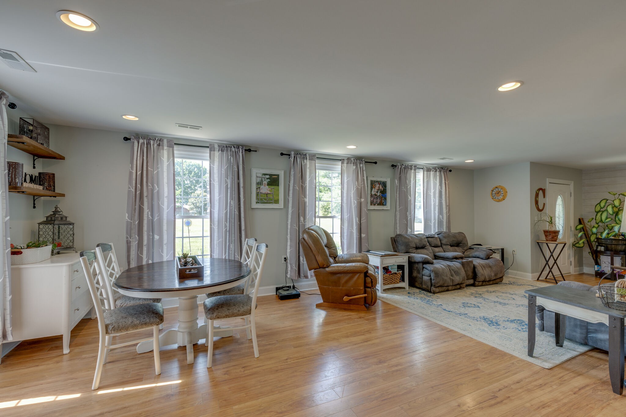 3003 Greens Mill Road Spring Hill, TN 37174 - Photo 5 of 48 a living room with furniture and wooden floor