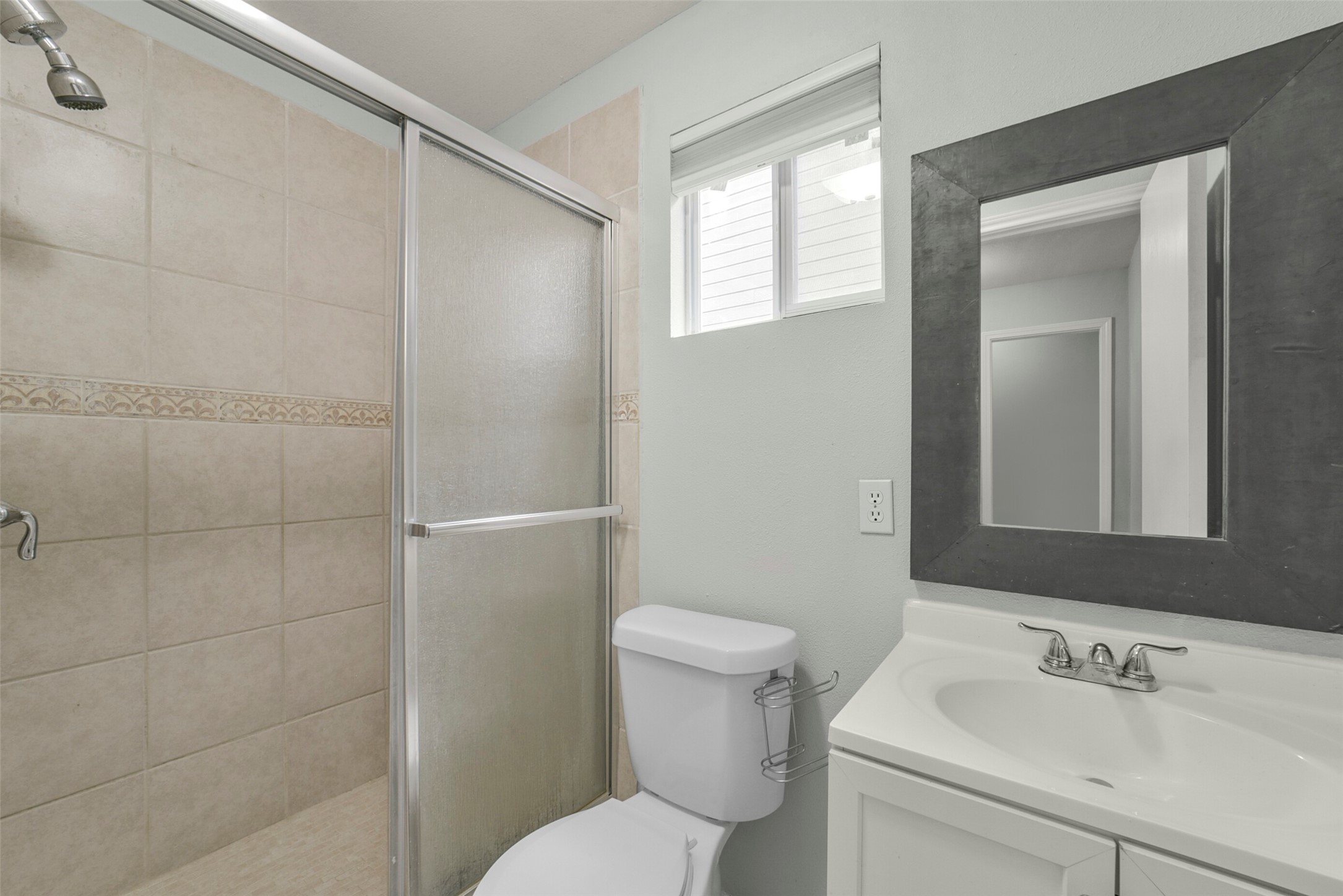 22 East New Avery Place Spring, TX 77382 - Photo 45 of 46 Full bathroom attached to Laundry room.