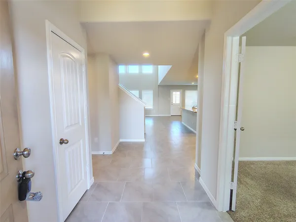 a view of entryway with bathroom