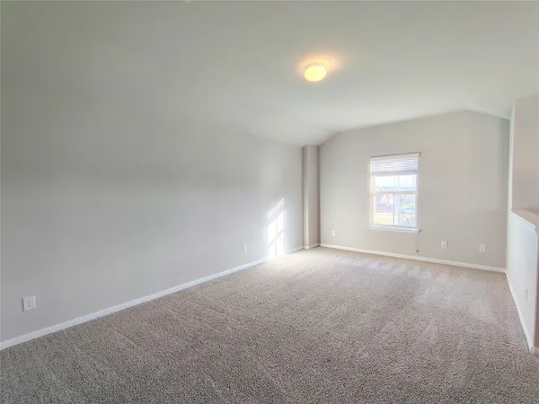 a view of empty room with window