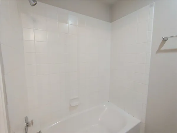 a close up of a bathtub
