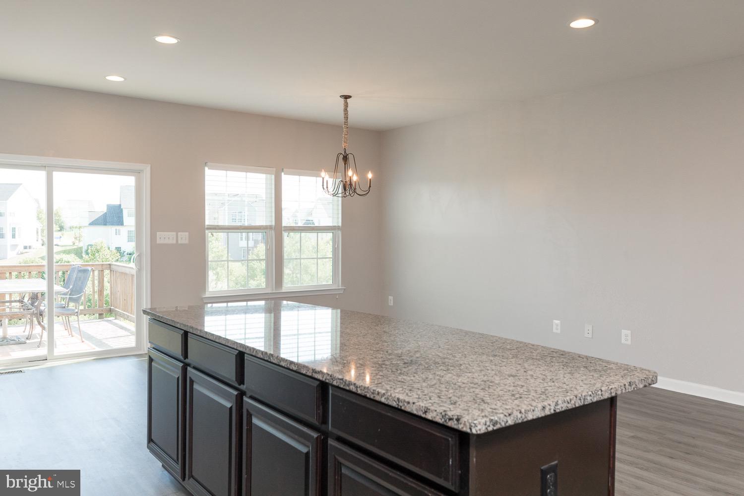 212 Fiesta Drive Stephenson, VA 22656 - Photo 13 of 37 View to morning room and dining area