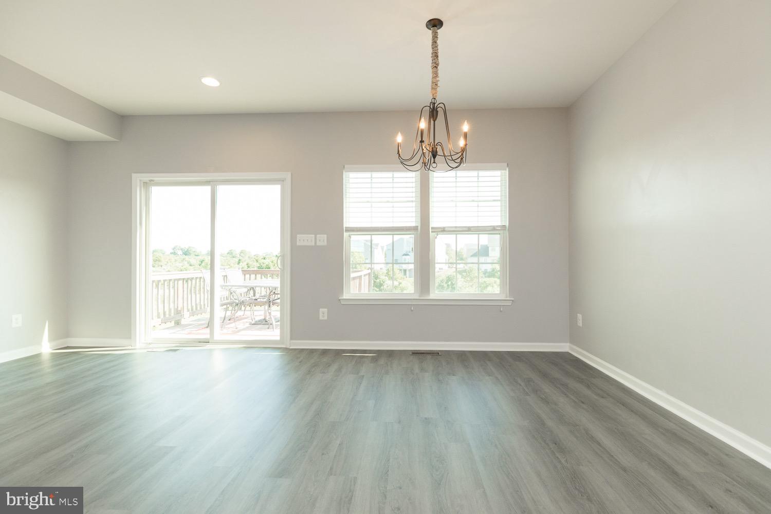 212 Fiesta Drive Stephenson, VA 22656 - Photo 15 of 37 Dining area and access to deck