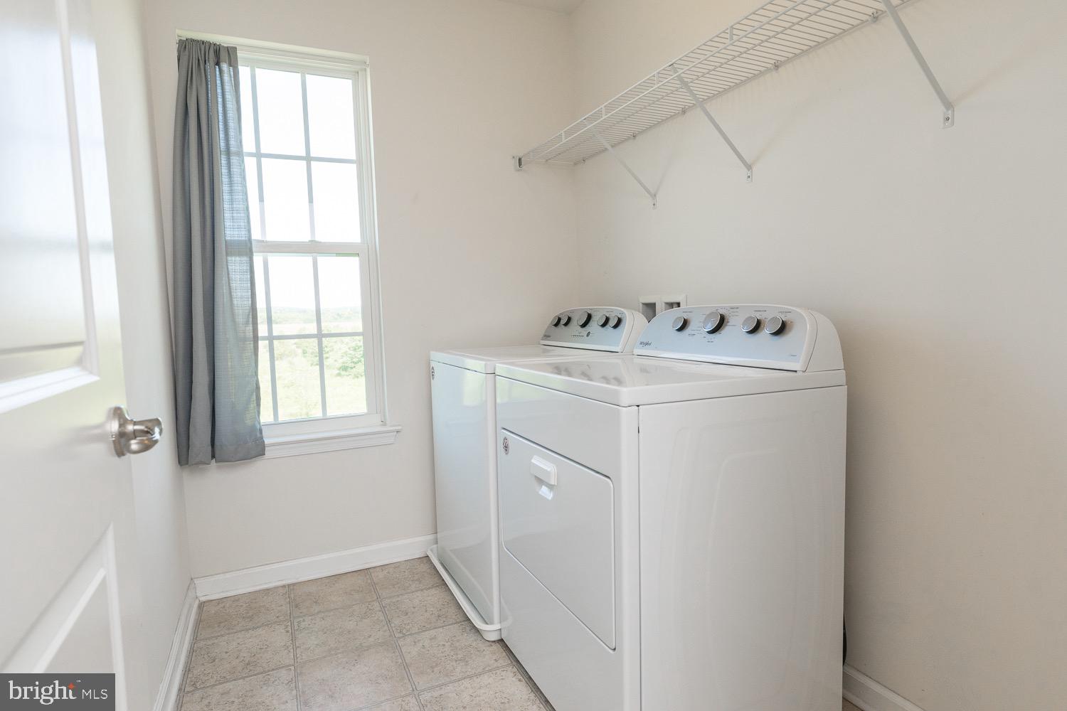 212 Fiesta Drive Stephenson, VA 22656 - Photo 25 of 37 Upper-level laundry room