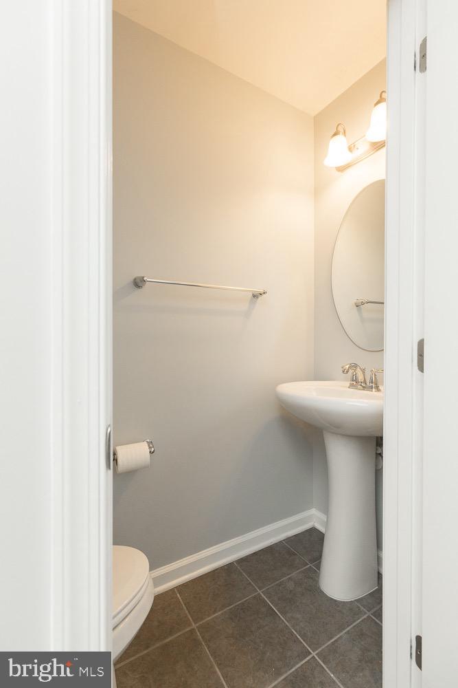 212 Fiesta Drive Stephenson, VA 22656 - Photo 5 of 37 Lower-level half bath