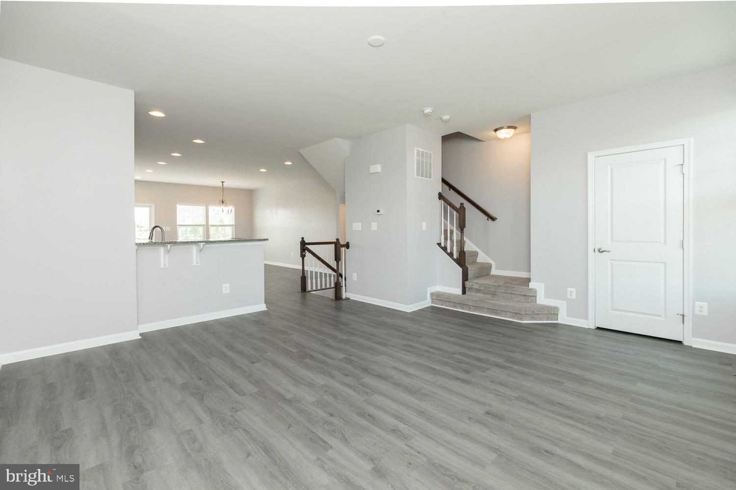 212 Fiesta Drive Stephenson, VA 22656 - Photo 6 of 37 Living room with vinyl plank floors