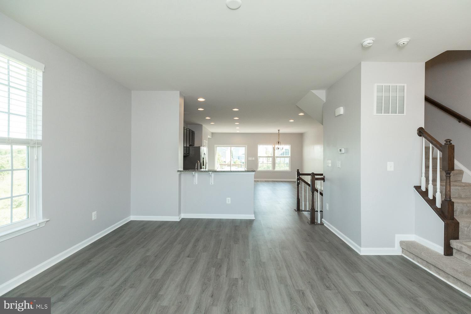 212 Fiesta Drive Stephenson, VA 22656 - Photo 7 of 37 Living room with view to the kitchen