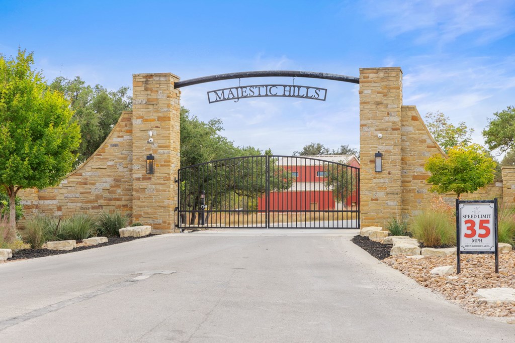 Lot 112 Star Point Circle, Unit 112 Blanco, TX 78606 - Photo 22 of 25 a view of a street with a building in the background