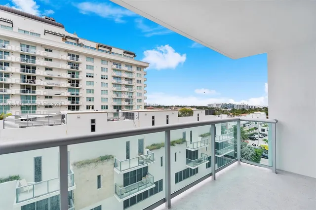 a view of a balcony with city view