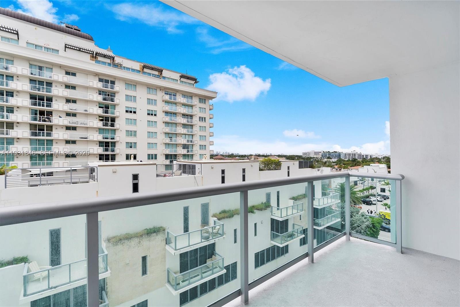 9511 Collins Avenue, Unit 606 Surfside, FL 33154 - Photo 28 of 43 a view of building from balcony