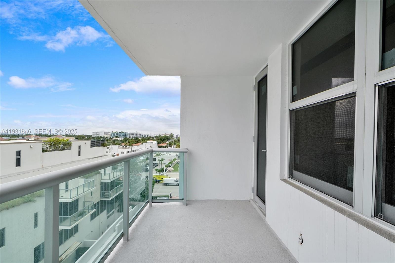 9511 Collins Avenue, Unit 606 Surfside, FL 33154 - Photo 29 of 43 a view of a balcony with city view