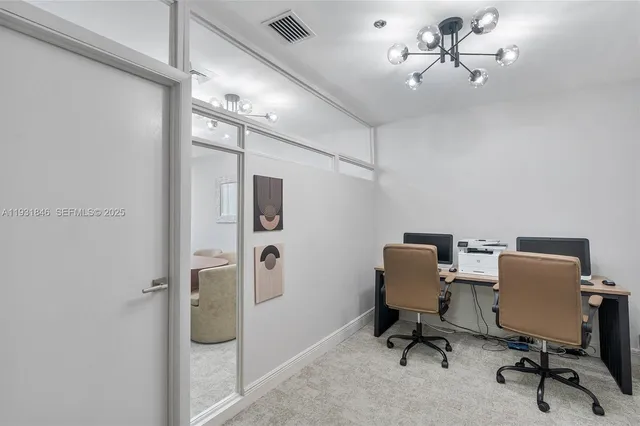 a room with lots of furniture wooden floor and windows