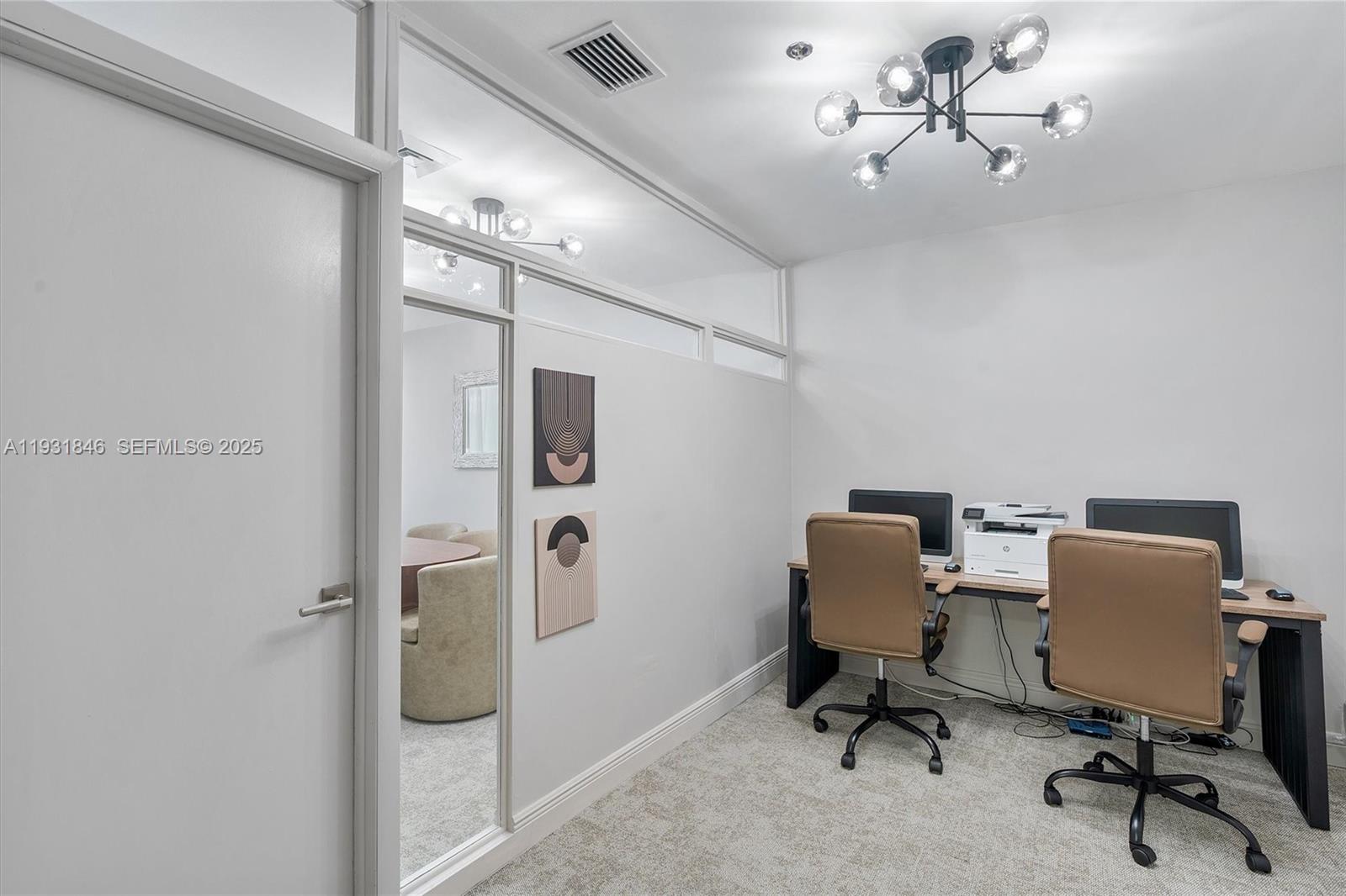 9511 Collins Avenue, Unit 606 Surfside, FL 33154 - Photo 32 of 43 a view of a workspace with furniture