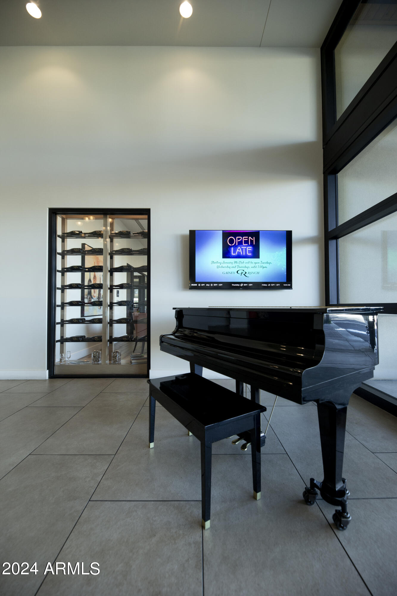 7760 East Gainey Ranch Road, Unit 5 Scottsdale, AZ 85258 - Photo 45 of 51 Clubhouse piano and wine