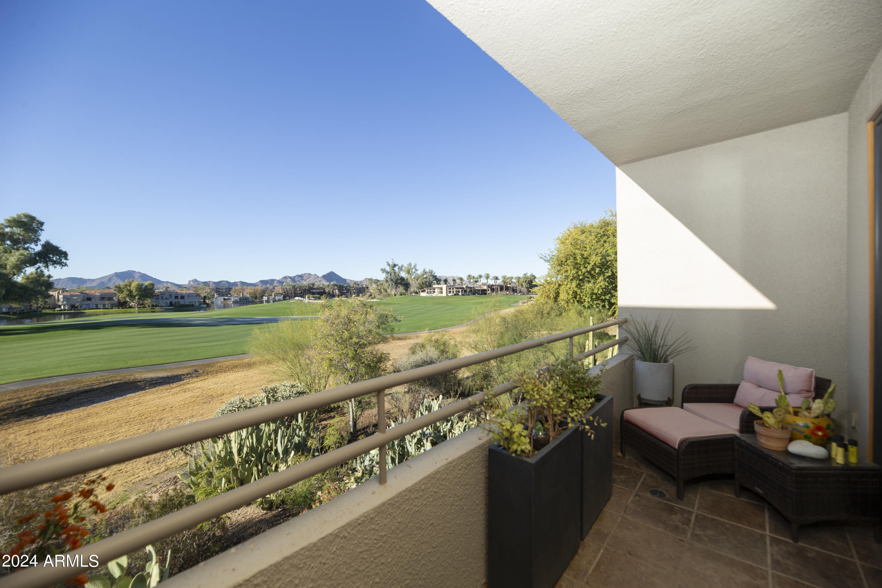 7760 East Gainey Ranch Road, Unit 5 Scottsdale, AZ 85258 - Photo 6 of 51 Master bedroom patio view