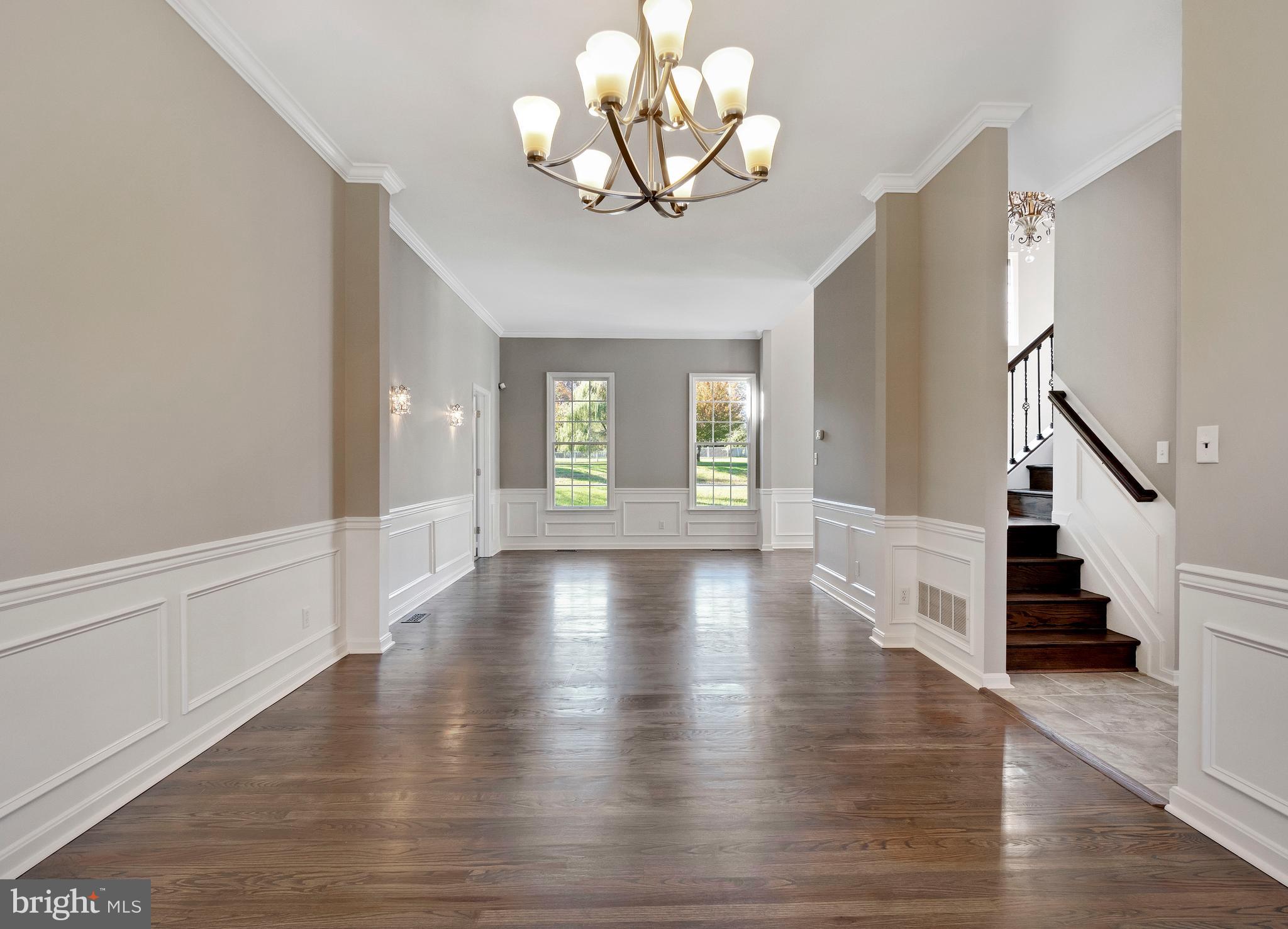 2220 Monkton Road Monkton, MD 21111 - Photo 12 of 45 an empty room with wooden floor and windows