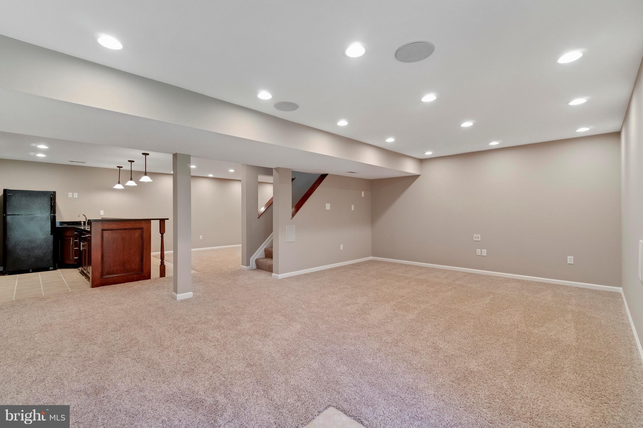 2220 Monkton Road Monkton, MD 21111 - Photo 29 of 45 an empty room with a projector and couches