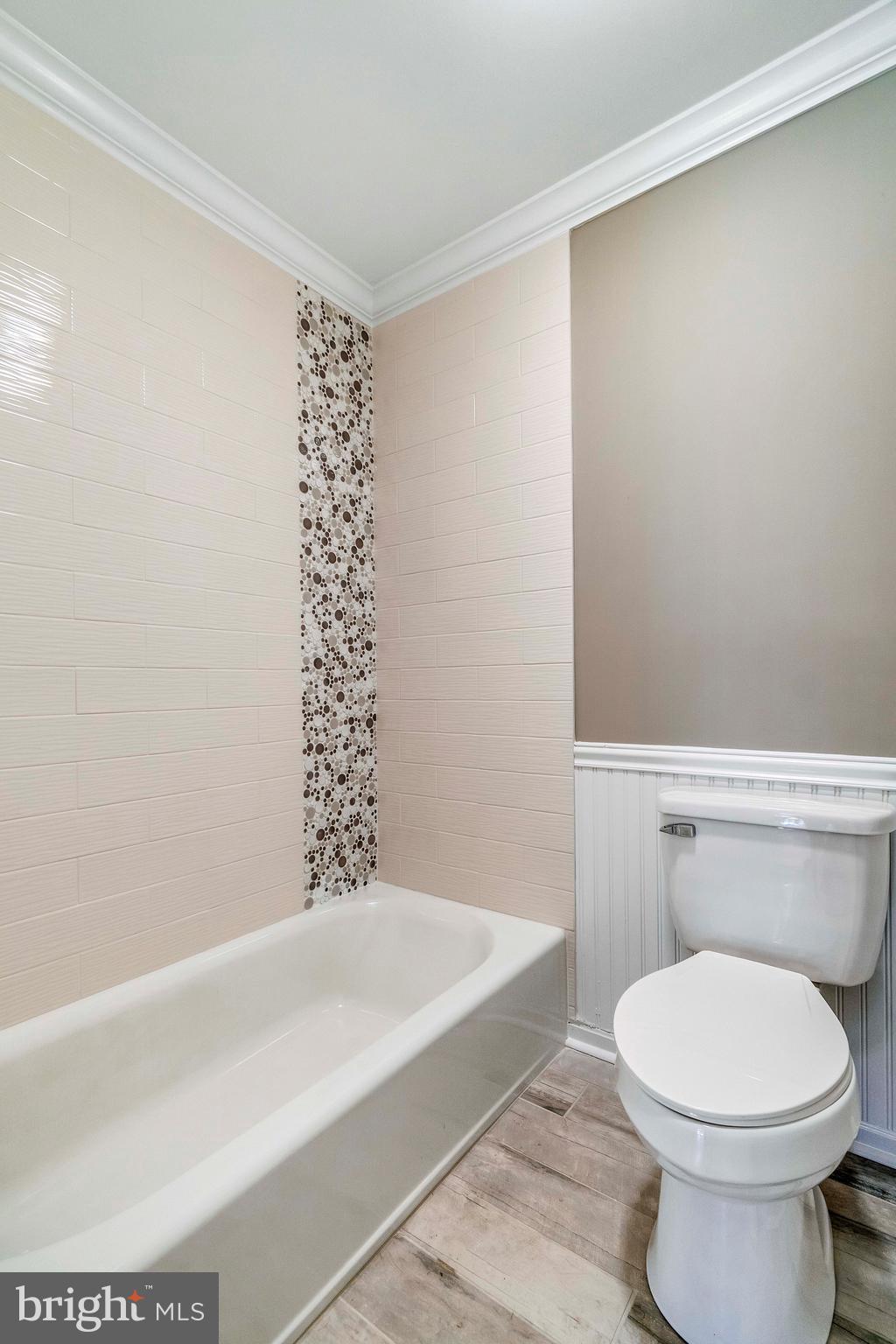 2220 Monkton Road Monkton, MD 21111 - Photo 40 of 45 a bathroom with a toilet a sink and bathtub