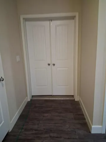 a view of room with hardwood floor