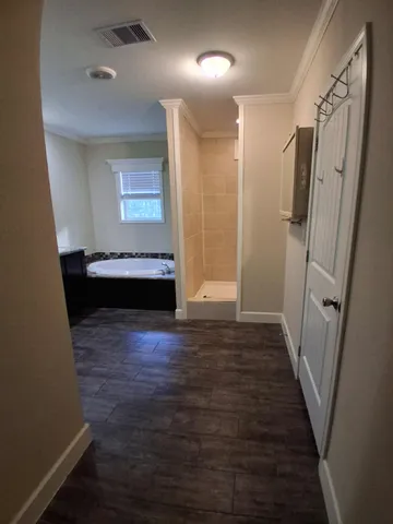 a view of entryway with wooden floor