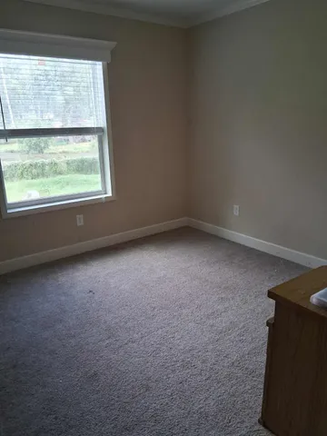 a close view of a sink and a mirror