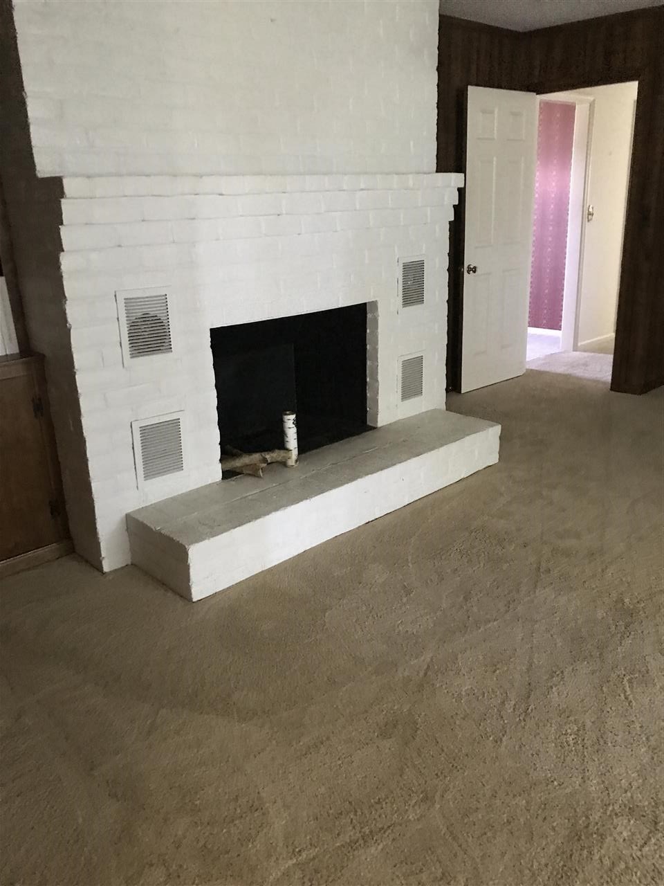 1497 Tinkling Spring Road Staunton, VA 24401 - Photo 11 of 31 a living room with a fireplace